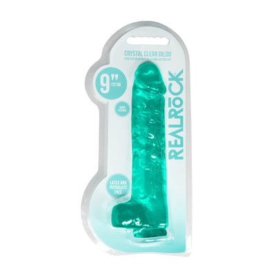 Turquoise 9-inch realistic dildo with suction cup in clear plastic packaging labeled Realrock Crystal Clear.
