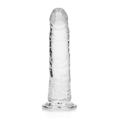 Clear slim 7-inch dildo with realistic texture and suction cup base for hands-free use and harness compatibility.
