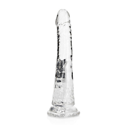 Clear slim 7-inch dildo with realistic texture and suction cup base for hands-free use.