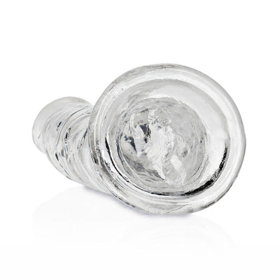 Crystal clear slim 7-inch dildo with suction cup base, smooth and flexible for versatile use.
