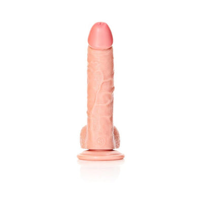 Light-colored curved realistic dildo with suction cup base and detailed texture standing upright on white background.