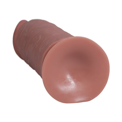 Realrock extra thick 9-inch dildo with suction cup base in natural skin tone, textured shaft for added stimulation.