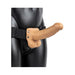 Vanilla-colored hollow strap-on with balls secured by adjustable black straps on a black mannequin torso.