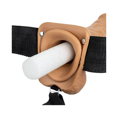 Close-up of Realrock hollow strap-on with adjustable black straps and protective insert in vanilla color.