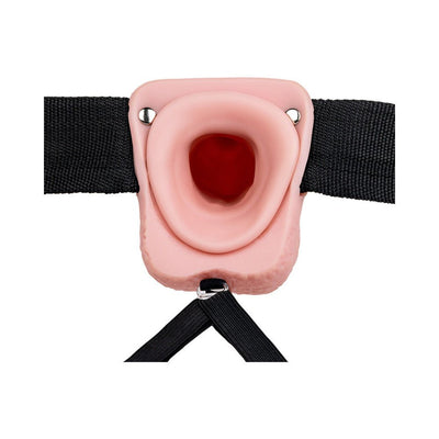 Vanilla-colored hollow strap-on with adjustable black straps and realistic design details.