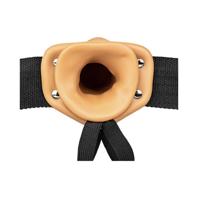 Realrock hollow strap-on with adjustable black straps and a 6-inch soft, flesh-toned insertable sleeve without balls.