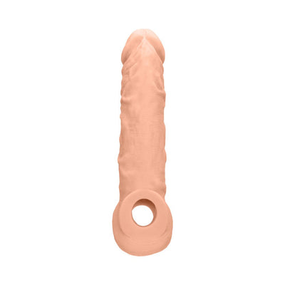 Realrock 8-inch flesh-toned textured penis sleeve with strap hole for secure fit.