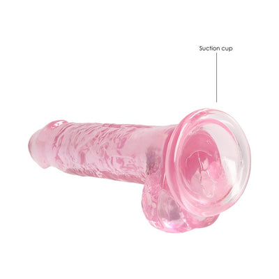 Pink realistic dildo with suction cup base and detailed texture, 7 inches in length.