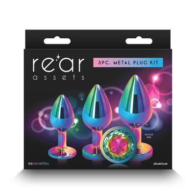 Rear Assets 3-piece metal plug kit with graduated sizes in iridescent rainbow aluminum finish and jeweled bases in original packaging.