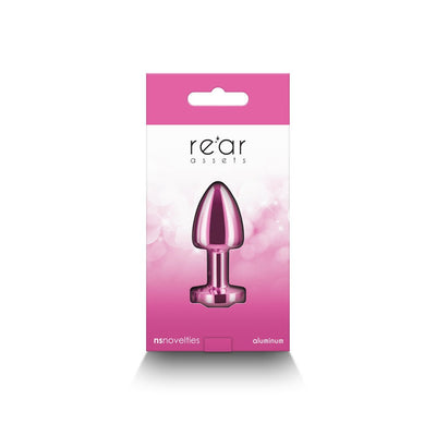 Pink chrome-plated petite metal anal plug in retail packaging with Rear Assets branding and aluminum label.