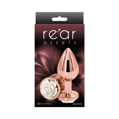 Medium-sized rose gold aluminum anal plug with white rose detail on the base, displayed on elegant packaging.