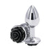 Small chrome-plated metal butt plug with a decorative black rose base, sleek and polished design.