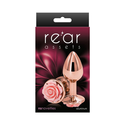 Rose gold small metal butt plug with a decorative pink rose base on a dark pink and black background packaging.