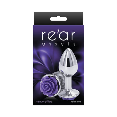 Small chrome-plated aluminum butt plug with a purple rose design on the base in retail packaging.