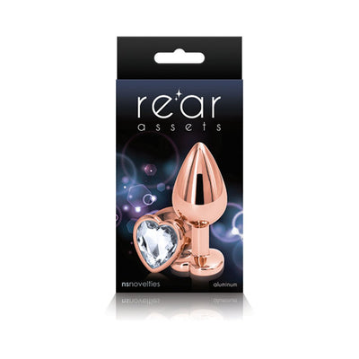 Rose gold medium-sized metal butt plug with heart-shaped clear gem base in black packaging