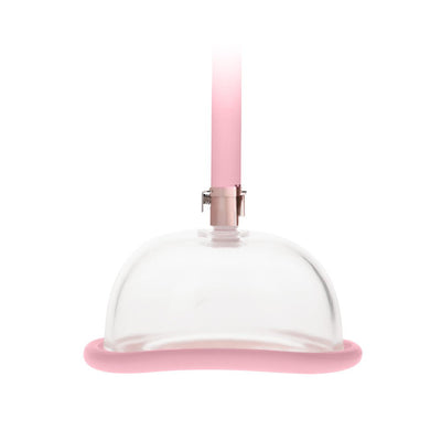 Clear acrylic dome with pink silicone rim and attached pink pump handle for intimate suction use