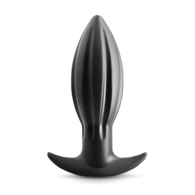 Black silicone anal plug with a tapered, ribbed design and a curved base for comfort and safety.