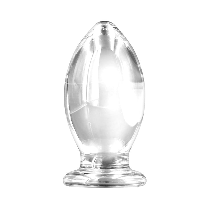 Clear oversized glass anal plug with smooth tapered shape and flared base for safe use.