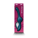 Teal flexible personal massager with rotating motor shown in purple packaging labeled Revolution Tsunami.