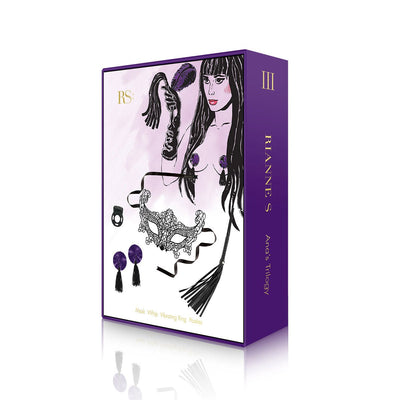 Rianne S Ana's Trilogy Kit 3 packaging featuring illustrated woman and images of mask, whip, vibrating ring, and purple sequin pasties.