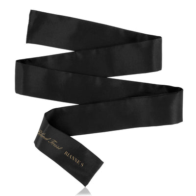Black satin blindfold with gold lettering from Rianne S, designed for sensory play and intimacy enhancement.