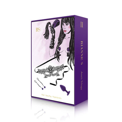 Rianne S Ana's Trilogy Set 2 packaging featuring a lace mask, purple silicone plug, and nipple jewelry illustration.