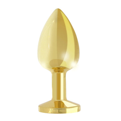 Gold plated metal butt plug with a smooth tapered shape and flat base, designed for comfortable wear and easy removal.