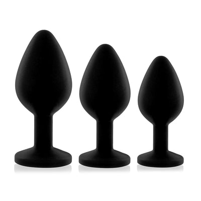 Set of three black silicone butt plugs in small, medium, and large sizes with flared bases.