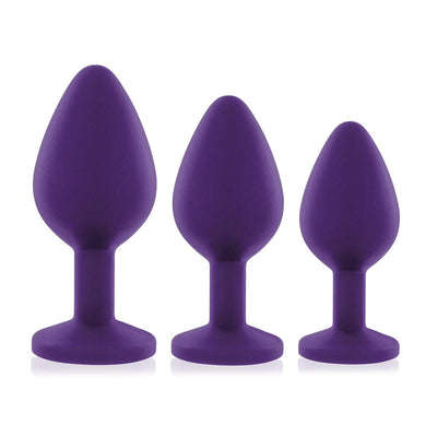 Set of three purple silicone butt plugs in small, medium, and large sizes with flared bases for safe use.