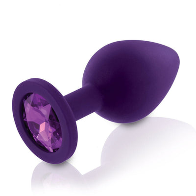 Purple silicone butt plug with a faceted gem base, designed for comfortable and elegant intimate use.