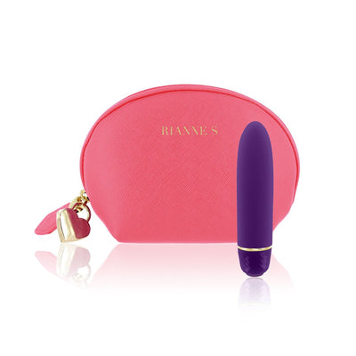 Purple silicone vibrator with gold accents next to a pink cosmetic pouch with heart charm and Rianne S logo.