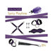 Purple bondage kit with cuffs, blindfold, feather tickler, nipple clamps, cross straps, and soft whip for sensual play.