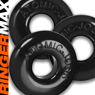 Three black OxBalls Ringer Max rubber rings with embossed Atomic Jock branding stacked on a white background.