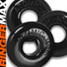 Three black OxBalls Ringer Max rubber rings with embossed Atomic Jock branding stacked on a white background.