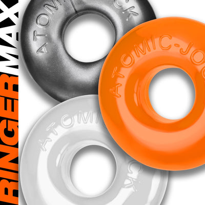 Three colorful OxBalls Ringer Max rubber rings in black, orange, and white with embossed branding on a white background.