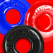 Three colorful OxBalls Ringer Max rubber rings in blue, red, and black on a red background.