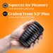 Hand holding a black ribbed Rize Grasp self-lubricating stroker against an orange background with product benefits text.