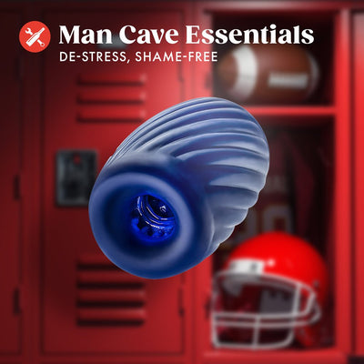 Blue ribbed self-lubricating stroker with textured interior, displayed against a red locker and football helmet background.