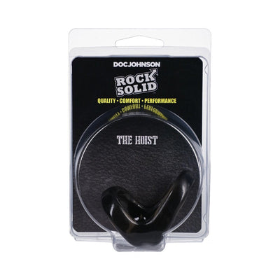 Black Rock Solid The Hoist cock ring in clear plastic packaging with black and yellow branding.