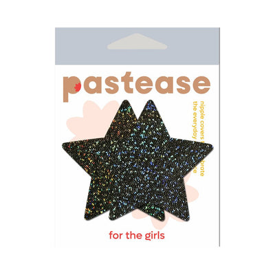 Pair of black glitter star-shaped nipple covers on Pastease branded packaging with neutral and red text.