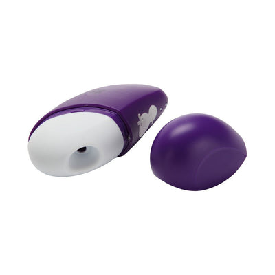 Purple ROMP Discreet Suction Vibrator with white silicone suction head and matching purple protective cap removed, shown on white background.