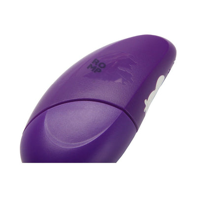 Close-up of the ROMP Discreet Suction Vibrator Free in purple with white trim, showing smooth ergonomic design and logo.