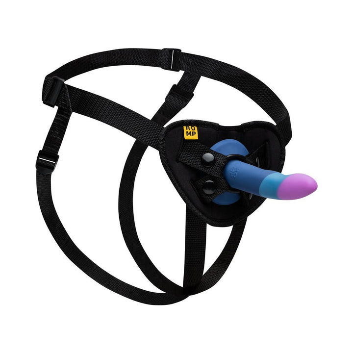 Adjustable black harness with a blue and purple silicone dildo attached, designed for pegging play.