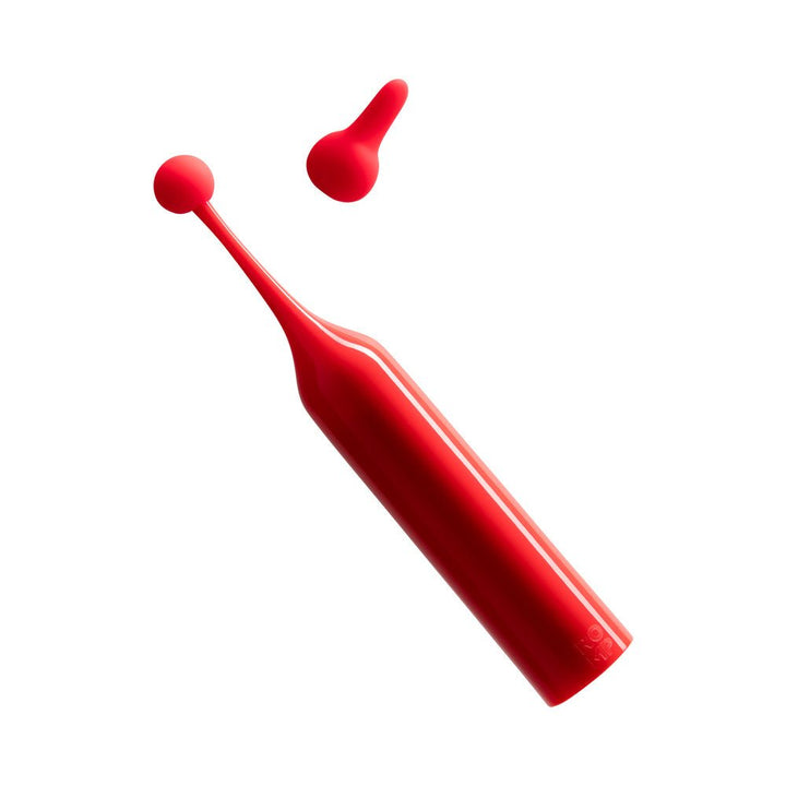 Red Romp Pop clitoral stimulator with two interchangeable silicone heads on a white background.