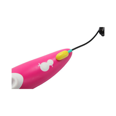 Close-up of the hot pink Romp Shine Pink clitoral air vibrator with white trim and yellow magnetic USB charging connector attached.