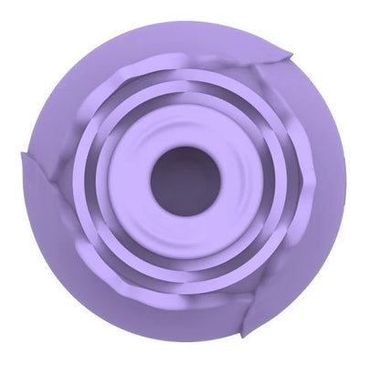 Top view of a lavender rose-shaped suction stimulator with concentric petal design and central opening.