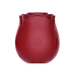 Compact red rose-shaped suction stimulator with soft silicone petals and ergonomic design.