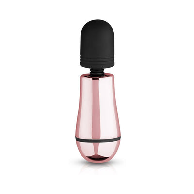 Compact rosy gold mini massager with a soft black silicone head and sleek metallic handle.
