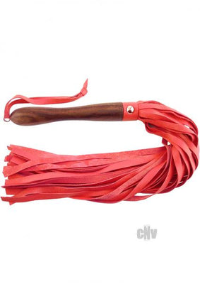 Black leather flogger with multiple red leather tassels and a polished wooden handle with wrist loop.