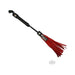 Mini leather flogger with black handle and red tassels, 10 inches long with wrist strap.
